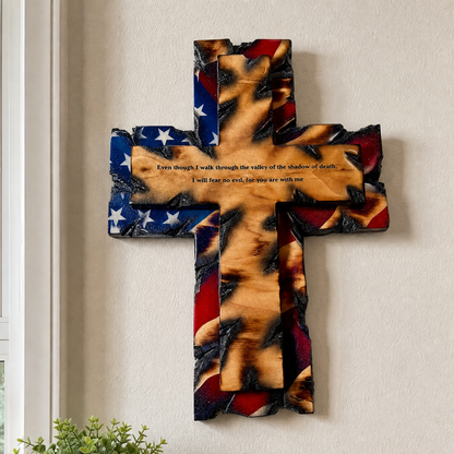 Tattered Flag Cross on an entryway wall above a console table